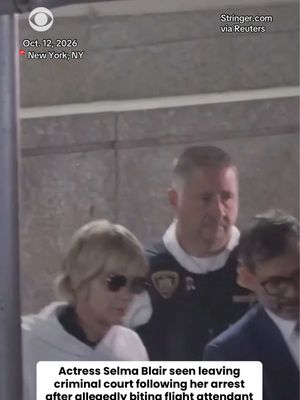 Actress Selma Blair was seen leaving Queens Criminal Court following her arraignment on Monday. She was arrested after allegedly biting a flight attendant on board a Delta Air Lines flight from Los Angeles to New York's John F. Kennedy International Airport on Sunday night. Following her arrest, she allegedly kicked a police officer and a nurse and is facing two assault charges. #selmablair #newyork #losangeles #airport 