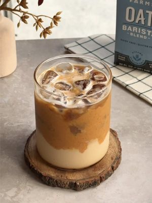 the peanut butter + coffee milk combo is elite☕️✨it’s made with a homemade coffee milk using @Califia Farms Oat Barista Blend, a creamy peanut butter sauce, and finished off with espresso #CalifiaPartner  🥜 peanut butter sauce: to a pot, add 2 tbsp white sugar, 2 tbsp brown sugar, 2 tbsp creamy peanut butter, 2 tbsp Califia Farms Oat Barista Blend, and 1/3 cup water. stir and simmer over medium low heat for ~5 minutes until smooth. turn off the heat and add a splash of vanilla extract. optionally, strain the sauce for a smooth consistency and set aside to cool.  🥜 coffee syrup: mix 1/2 tsp instant coffee, 1/2 tsp white sugar, and 1 tsp hot water until combined  🥜 spread peanut butter around the walls of a glass 🥜 for the coffee milk, add the coffee syrup, ice, 6 oz Califia Farms Oat Barista Blend, and mix  🥜 pour 2 tbsp peanut butter sauce (adjust to your preference) and top with 2 shots of espresso 