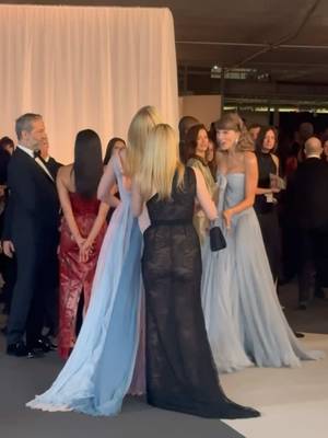 #TaylorSwift made a beeline for Dakota and Elle Fanning at the 2026 Academy Museum Gala. Read all about the looks from the star-studded Los Angeles event—including the singer’s #Dior dress—at WWD.com.   