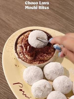 🍫 Chocolate Lava Mochi Bites 📝 Recipe 240g of Glutinous Rice Flour 270ml - 300ml of Hot Water Budy Jam (Chocolate Flavor) Roasted Glutinous Rice Flour & Milk Powder for mochi coating 60g of Cream Cheese 15g of Icing Sugar 30g Whipping Cream Cocoa Powder for dusting *servings: 20 mochi bites (25grams for each dough) Instructions: • Mochi with Chocolate Filling - mix glutinous rice flour with hot water until it forms a dough texture, and not sticky on hand - take 25grams of mochi dough to make bites version - flatten the mochi dough, add chocolate jam from Budy Jam as the filling, close the filling slowly, then shape the dough into a perfect circle • Boiling; Mochi  - prepare pot with water, boil water until it bubbles - put mochi in the boiling water and let it boil for 8 minutes / until the mochi floats - strain the mochi with a strainer when it’s done - coat the mochi bites with roasted rice flour that’s mixed with milk powder to prevent mochi sticking on each other • Cream Cheese Dip - mix cream cheese, icing sugar, and whipping cream with spatula / spoon - serve in a dipping bowl and dust with cocoa powder on top // Easy recipe at home with IC and @chompchompcandy 🤎 That chocolate jam inside the mochi bites is melting in my mouth, so good! 🫠 a classic taste of Budy Jam Chocolate as mochi filling is the best combination, I can’t wait to make another one 🤤 #mochi #chocolatemochi #SelaiBudyJam #KreasiBudyJam #SelaiCoklatKlasik 