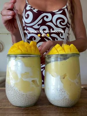 Making the viral mango sticky rice smoothie diy style! ☀️🥥🥭If you’re craving some tropics on this beautiful Monday morning create it in your own kitchen! Curious- whats the temperature where you’re at right now?? Also curious  if you’re a texture person or not? Like does this sound terrible or good to you? Haha If you’re a boba/tapioca lover- you’ll want to save this for later👇 Mango Sticky Rice Smoothie Recipe 🥭🥥  1/3 cup coconut tapioca pearl pudding (having this warm with mango is also a legendary combo 🤤) Mango Smoothie (for one)  1 frozen banana 1/2 cup approx frozen mango 1/2 cup approx frozen pineapple  1/3 cup approx orange juice  Blend until smooth- less liquid the thicker more ice cream like it will be. If using very little liquid you will have to blend and mash a handful of times and might have to stop and mix and restart the blend and mash a couple times. All together will take less then 1-2 min.  To build smoothie- put in tapioca pudding, a little fav yogurt for extra flare and then your mango smoothie oh and top with a fresh mango if can! Enjoy!! Oh and I updated the tapioca pudding recipe after making it 5 more times and it’s way easier and better! Let me know if you’d like it.  Wishing you all a Monday full of sunshine!☀️🌸🫶 Cute onsie is from @abysseofficial xo doubles as a swimsuit. A cute necklace is form @las.rais 🐚 And if you’re looking for more recipes- check out my meal planner! #mango #mangostickyrice #recipes #EasyRecipes