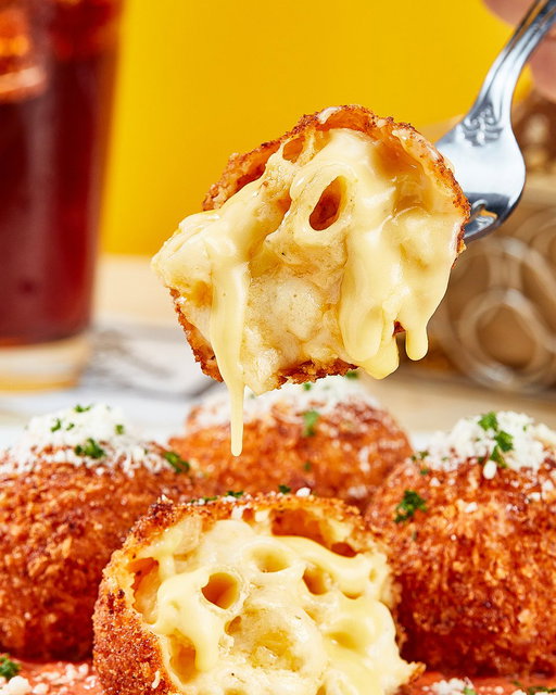 The best after school snack? Fried Macaroni and Cheese. 😍 

Cheesecake Rewards® members can get a $10 dining credit when they buy a $50 gift card online through 9/1. Must go through your member dashboard when purchasing. Dining credits are redeemable from 9/2 to 9/30. 