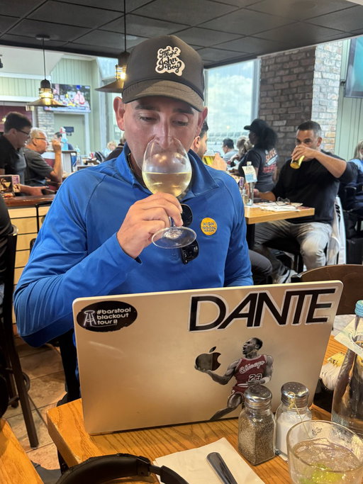 Unc drinking fucking wine with his fucking laptop on the chilis table as our flight keeps getting delayed for hours 