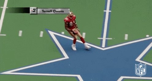 Terrell Owens and George Teague, Cowboys vs. 49ers, 2000. 