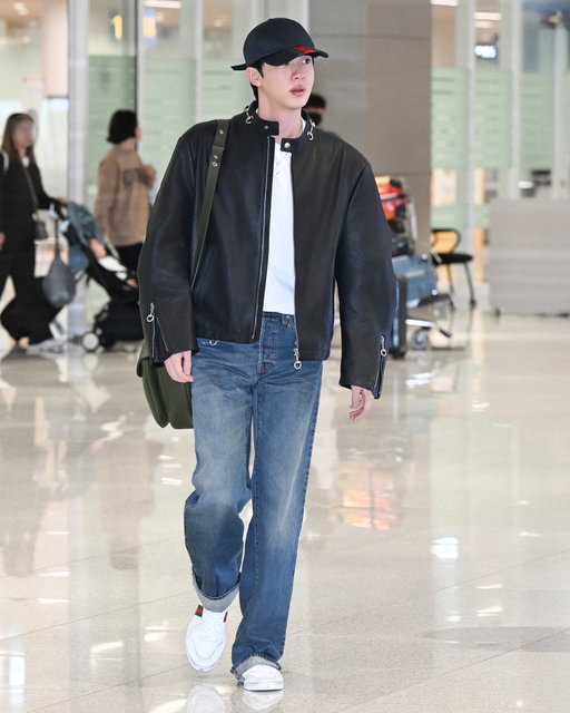 In a look from the new #GucciLaFamiglia collection, Global Brand Ambassador #Jin from @bts_bighit is spotted in Seoul. 