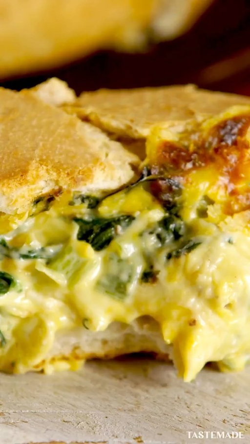 Baked with bacon, cheese and veggies, this warm dip is even tastier stuffed in a bread bowl. 