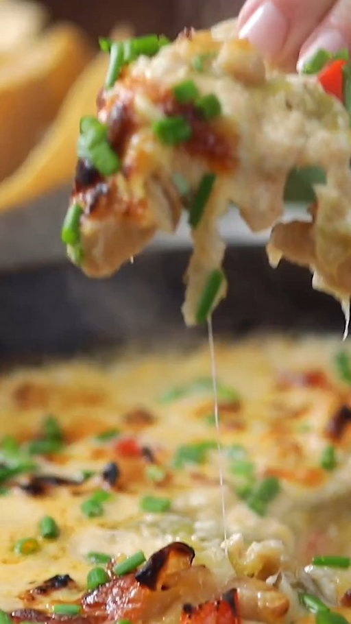 Baptize your tortilla chips in the holiness that is thick, cheesy white chicken chili dip. 