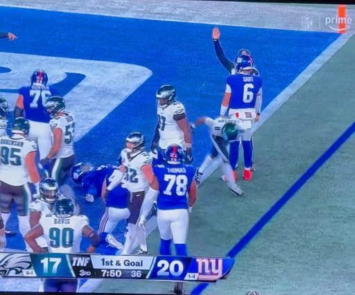 Jaxson Dart high fived the official 