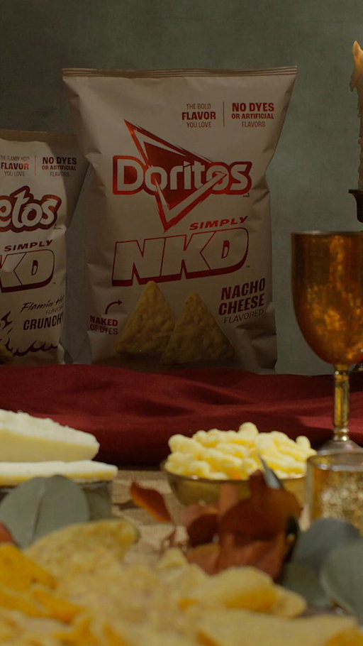 Hear ye, hear ye! Introducing Doritos and Cheetos SIMPLY NKD, now made with no dyes or artificial flavors. Available for pre-order now. 