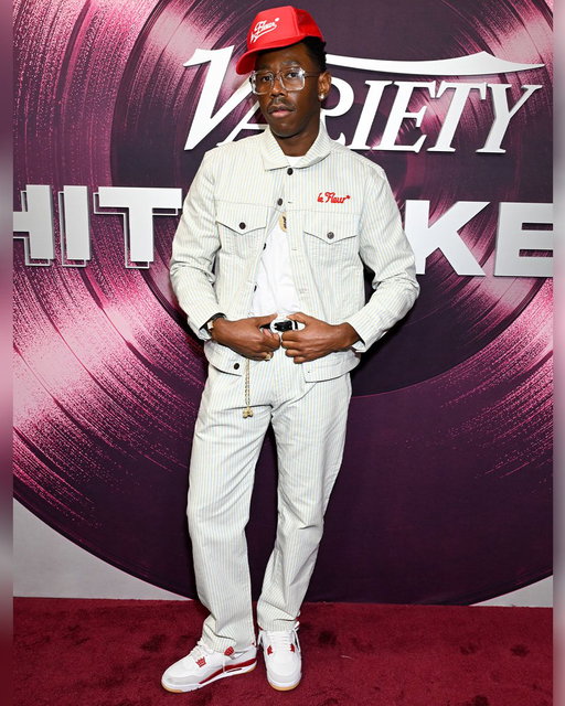 Tyler, the Creator wearing the Friends and Family Exclusive Nike SB X Air Jordan 4 “Varsity Red” at Variety Hitmakers receiving the Innovator of the Decade Award. 