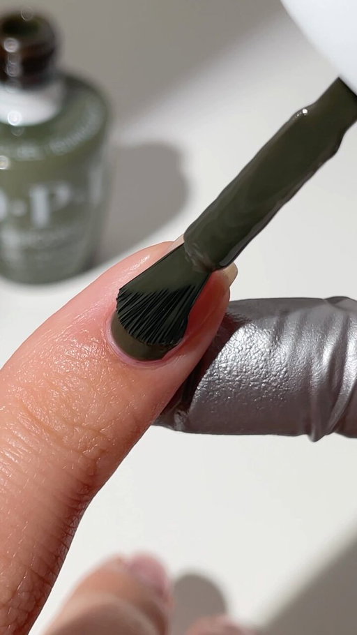 This deep olive green nail polish is having a moment. 🌲💅 Suzi - The First Lady of Nails is the perfect neutral-ish fall shade. 

#OPI #HolidayNails #olivenails #greennails 