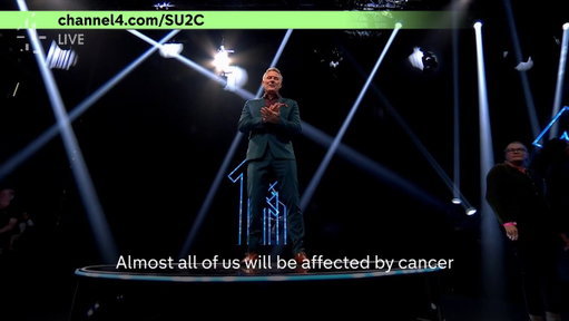 Adam Hills introduces the illumination of our Tribute Mile. Thousands of lanterns created by members of the public in memory of those we have lost #StandUpToCancer 