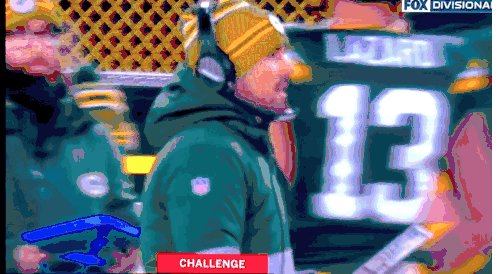 Oh no. What an INT by Surtain but Christian Watson is down on the turf injured....sure looks like either AC joint (separated shoulder) or collarbone....#Packers 