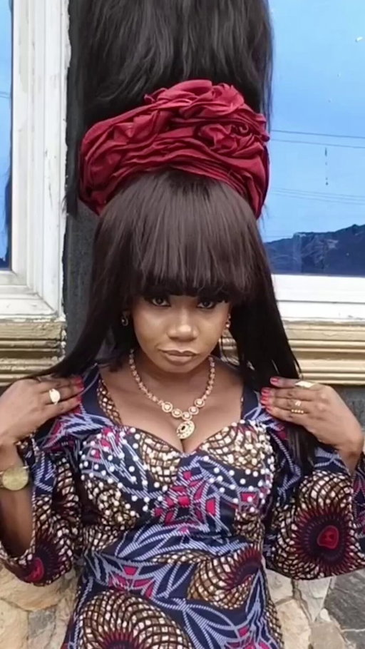Tallest wig - 15.37 metres (50.42 ft) made by Helen Williams (Nigeria) 