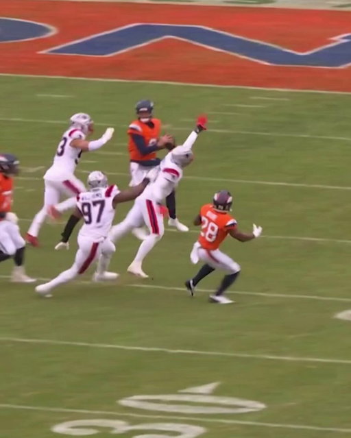 I have no clue how this is ruled a backwards pass

He’s clearly pushing the ball forward and it gets deflected and lands behind him 

You could say he fumbled but I don’t see a backwards pass 