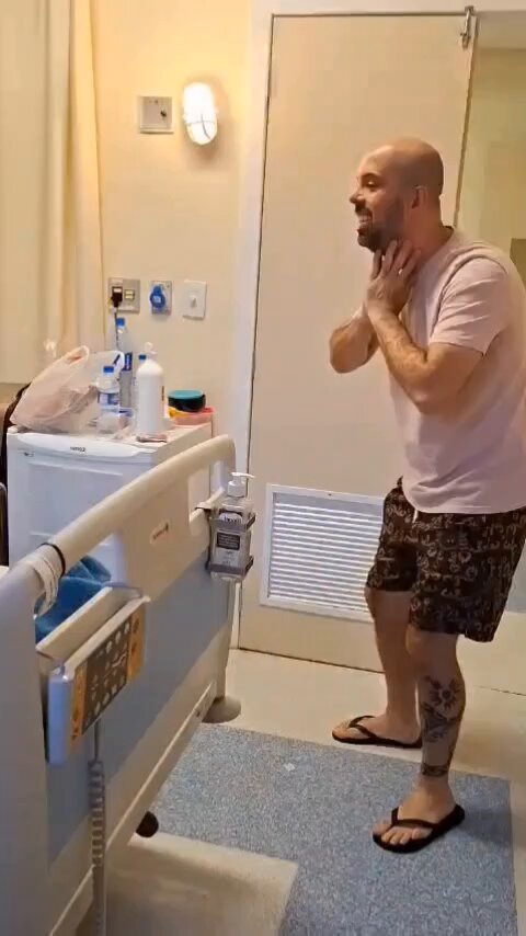 Father and daughter embrace for the first time in 22 days. She is undergoing cancer treatments and was finally able to hug her daddy. 