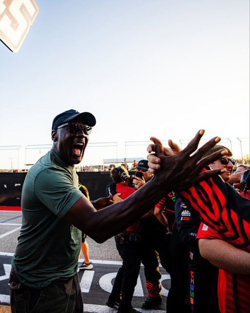 MJ celebrates another three-peat. 