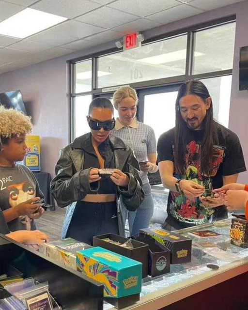 Kim Kardashian was spotted opening packs of Pokémon cards with Steve Aoki 👀 