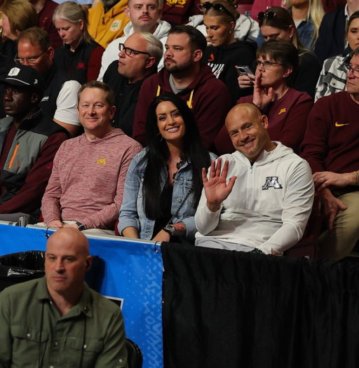 PJ Fleck, Heather Fleck, and Niko Medved at the Barn supporting @GopherWBB 〽️ 

#skiumah 