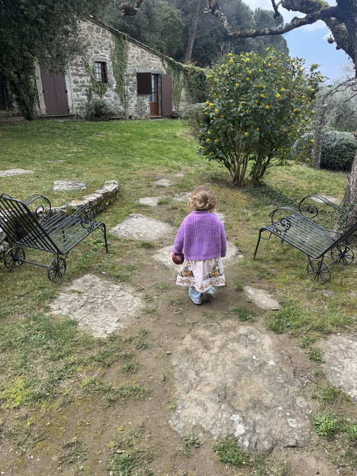 My daughter insisted on bringing her American football to Tuscany, clinging to it 
