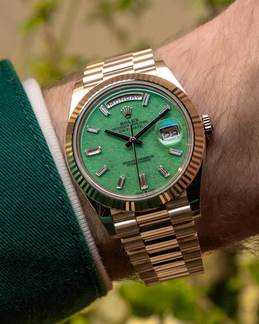 A closer look at Rolex’s new Day-Date in Jubilee Gold.

Introduced as part of the brand’s 100th anniversary of the Oyster case, this 40mm execution features a new proprietary alloy that sits between yellow gold and Everose, offering a softer, warmer tone across the case and bracelet.

The dial stands out with a light green aventurine surface, bringing a subtle texture and depth that shifts in the light, paired with baguette-cut diamond hour markers for a more elevated take on the Day-Date format, powered by the Calibre 3255 and offered as an off-catalog configuration.