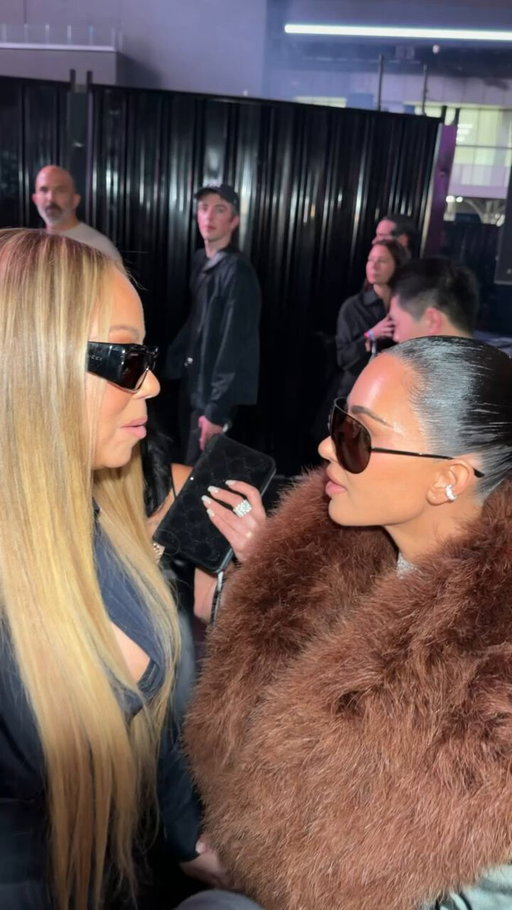 What do we think Mariah Carey and Kim Kardashian were chatting about at the Gucci Cruise show...lip readers pls step to the front #KimKardashian #MariahCarey 