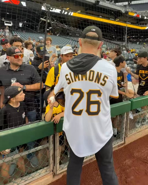 Just J.K. Simmons signing drumsticks at the ballpark 🥁 