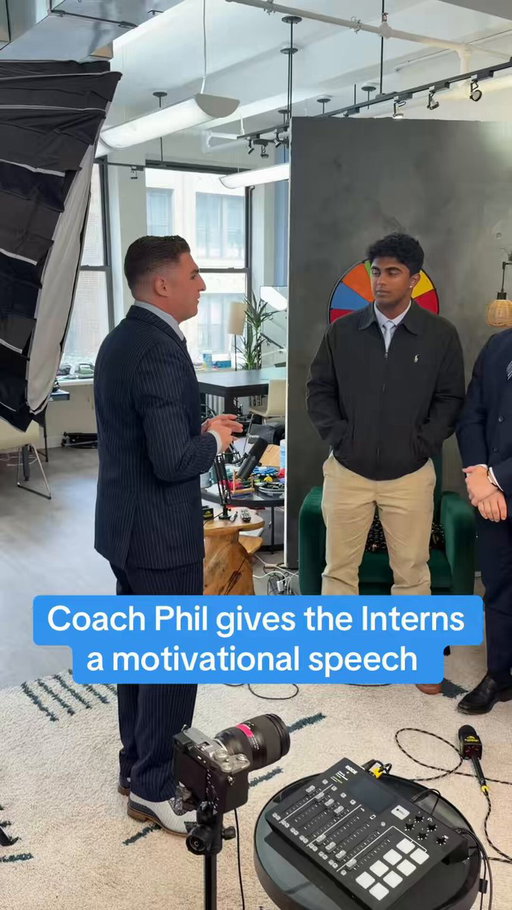 Coach Phil firing up the interns for a great summer 