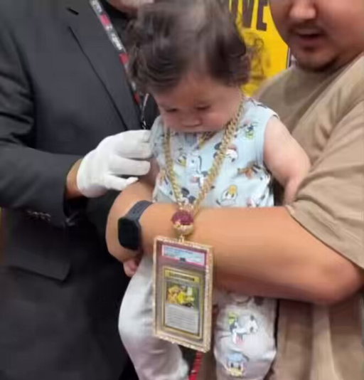 The youngest person to ever wear the world’s most valuable trading card 👀 