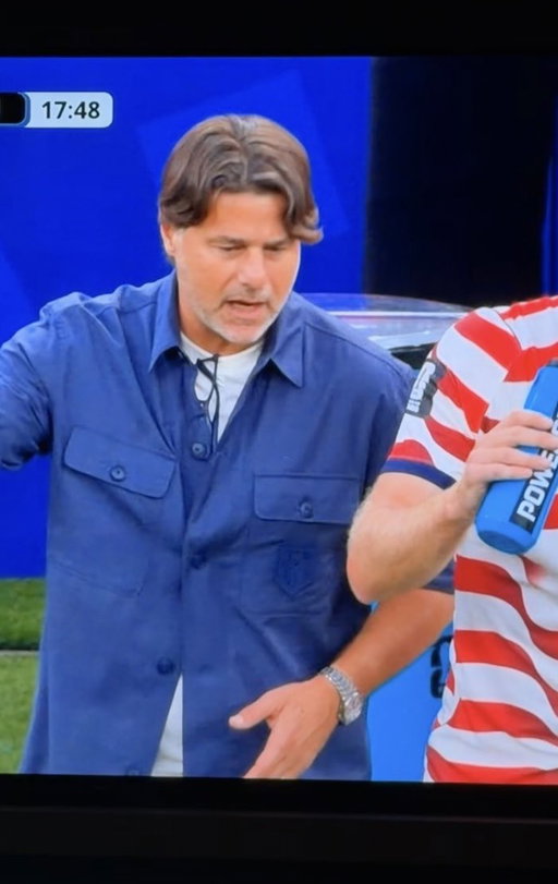 This is the USA manager? Holy casual Friday. What a look for the World Cup. 