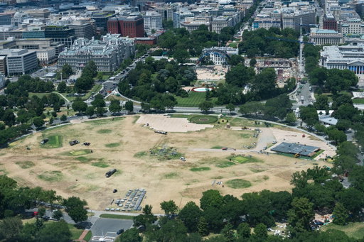 An aerial view shows crews dismantling the UFC fighting venue on the South Lawn of the White House.

The grass on the Ellipse has been completely destroyed following the UFC viewing party.

REUTERS/Aaron Schwartz 