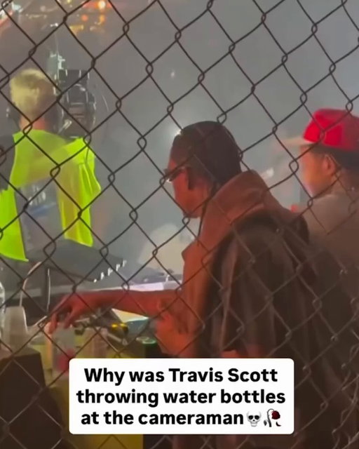 Travis Scott throws water bottles at a cameraman to get him to move out of the way at a recent concert.

On June 27, La Flame was among the artists who performed at Amazon Music Night during the Nike TOMA National Final in New York City. A clip has been circulating online from the event that shows Travis behind the DJ booth while the DJ hypes up the crowd. In the short clip, a cameraman who is filming the crowd stands directly in front of the rapper, resulting in Travis tossing multiple water bottles at the man to try to get his attention.

After Travis throws two bottles, the cameraman finally notices and moves to the side, as Travis appears to explain himself. 

🎥: bziannn/Instagram