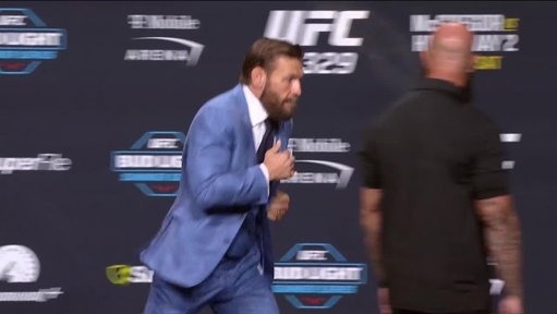 CONOR MCGREGOR AND MAX HOLLOWAY GO NOSE TO NOSE 