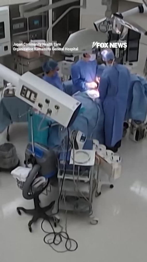 Surgeons cling to a patient on the operating table mid-surgery as a powerful 7.1 magnitude earthquake violently shakes a Japanese hospital.

Surveillance video shows equipment rattling and staff scrambling to keep items from falling while the surgical team works to protect the patient as the room moves around them.

The earthquake struck southwestern Japan, killing at least 39 people and forcing thousands into evacuation centers.