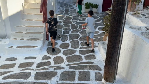 It’s easy to put down Mykonos and Santorini for crowds and high prices, but I came away from this year’s research liking both even more. Here’s a moment of Mykonos bliss…two boys lost in friendship, sharing a moment oblivious to everything but their soccer ball. 