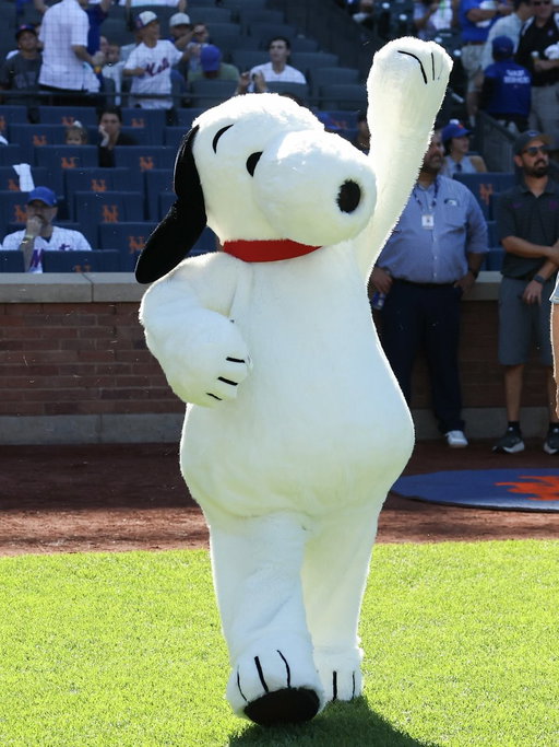 A very special first pitch on Peanuts Day! 🐶 