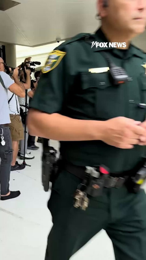 NEW: Tiger Woods emerges from court with Vanessa Trump by his side after accepting a plea deal that suspends his driving privileges for five years.

Woods plead guilty to reckless driving and refusing to submit to a lawful test in connection with his March rollover crash, while prosecutors drop the DUI charge.

The golf star stays silent as reporters surround the couple outside court, capping a brief appearance where Woods speaks only to confirm he read the deal.