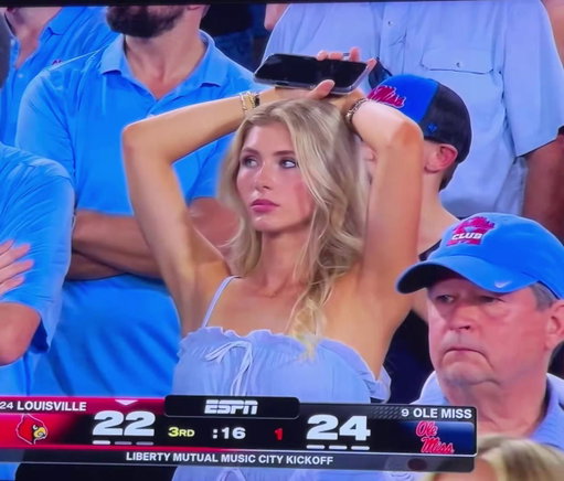 🚨TRENDING: This Ole Miss fan is going viral for looking worried during this back and forth game with Louisville.  