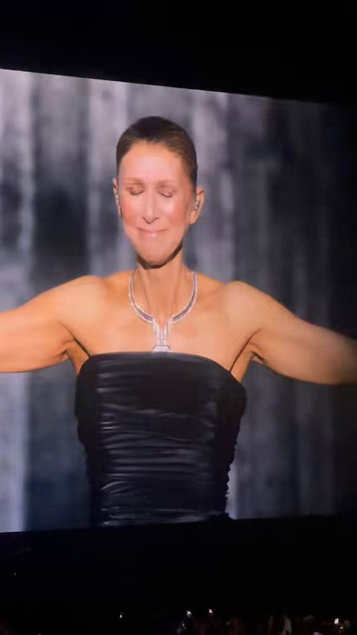 Céline Dion cries as she takes the stage in Paris for her first headlining performance in six years 