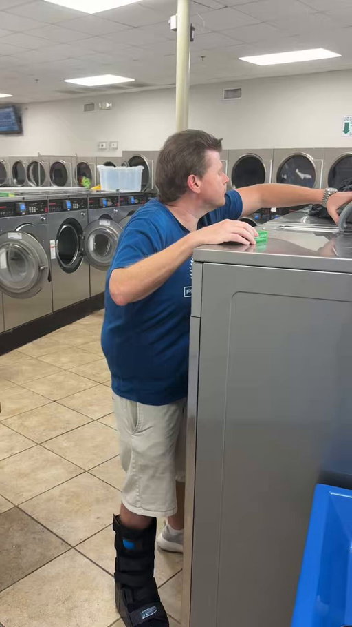 Mintzy has loaded up the machine with his clothes, put all the detergent he bought in, and is ready to start his laundry

Unfortunately the machine he chose is out of service (per the sign on the front of his machine) 