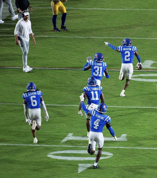 Before it's all said and done, this may end up being the College Football photo of the decade. 