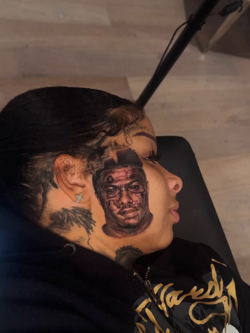 After undergoing two rounds of laser tattoo removal treatments last year, Chrisean Rock has upgraded the Blueface tattoo on her face.

Los Angeles-based tattoo artist Nihat Uzuntepe shared videos documenting the process and the final result after adding new ink to Chrisean's face. The updated Blueface portrait now includes the rapper's more recent facial tattoos, which he got while in jail, unlike the original version.

Chrisean and Blue used the same artist for their respective tattoos. This week, Blue also had her name tattooed on his back.

What do you think of Chrisean's upgraded ink?