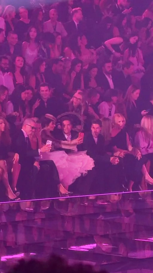 Dylan Sprouse and Lisa Rinna grabbing a quick photo front row together at last night’s #VictoriasSecretFashionShow 🪽 Important. 
