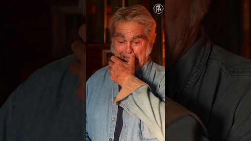 Man Shows Us His Antique Wooden Boy Pillow