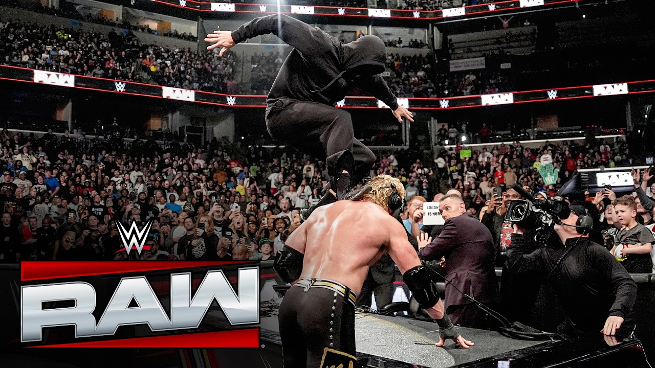 The masked assailant attacks after The Vision defeat The Usos & LA Knight: Raw highlights