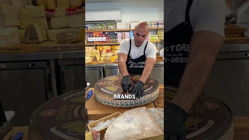Opening a 65 pound wheel of Comte cheese #cheese #cheesemonger