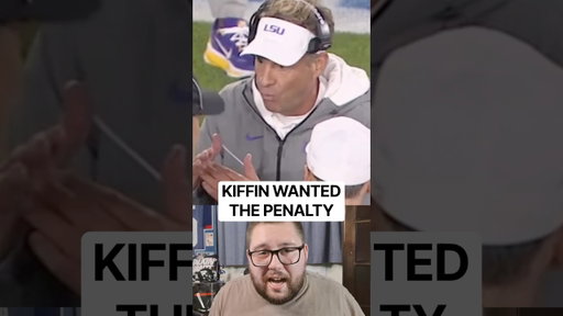 Lane Kiffin celebrates a penalty that never got called