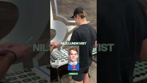 Asking Dallas Stars players to sign old photos of themselves