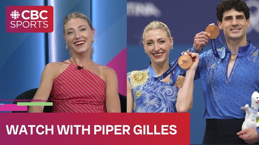 Piper Gilles watches and reacts to bronze medal Olympic performance