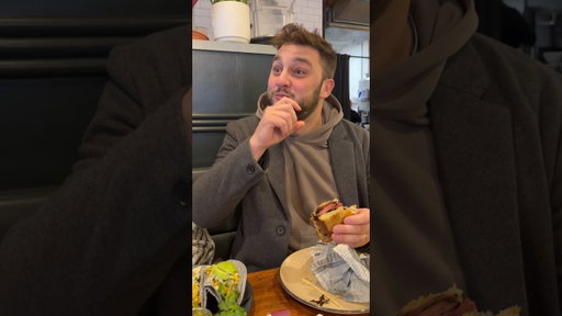 Trying a Reuben sandwich for the first time